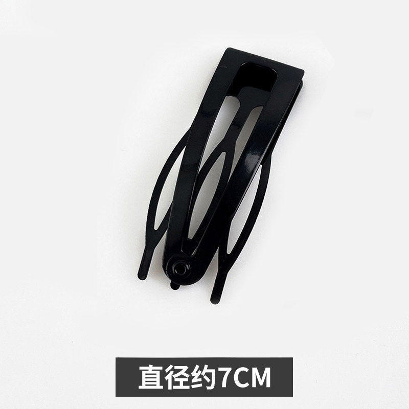 2 # Black large comb clip, approximately 7cm