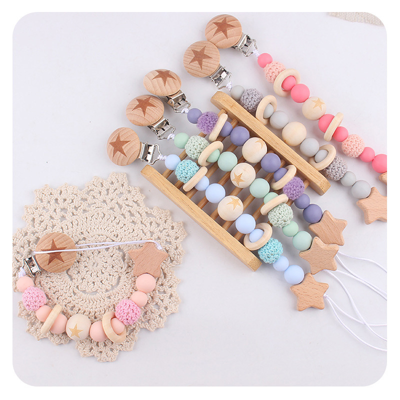 Nuevos productos infantiles de haya Júpiter estrella agujero redondo clips bebés creativos tetas cadena de silicona mordida juguetes a prueba de la cadena