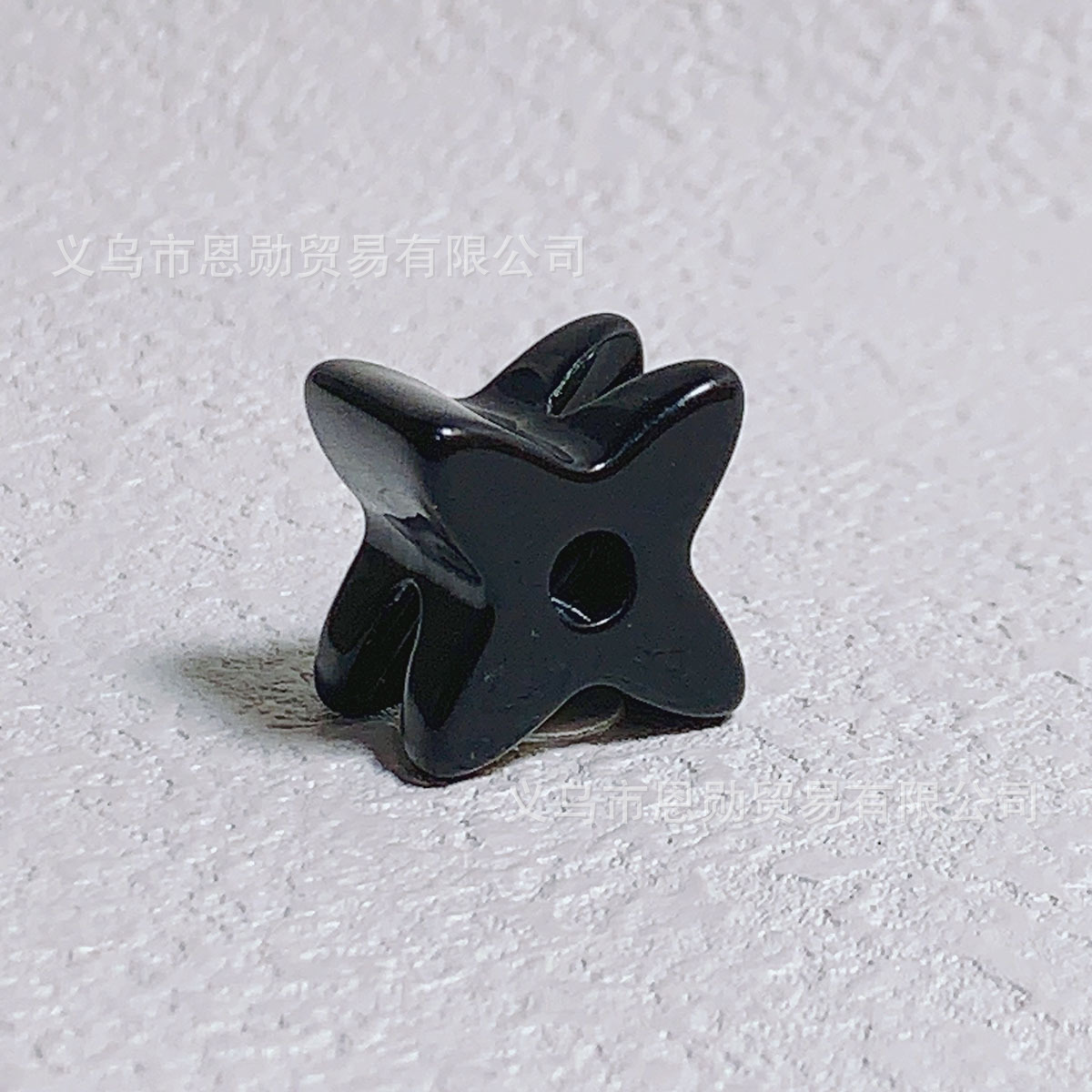 X (Black)