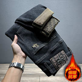 牛仔裤男冬季加绒加厚2024高端潮牌修身小脚微哈伦印花欧洲站男裤