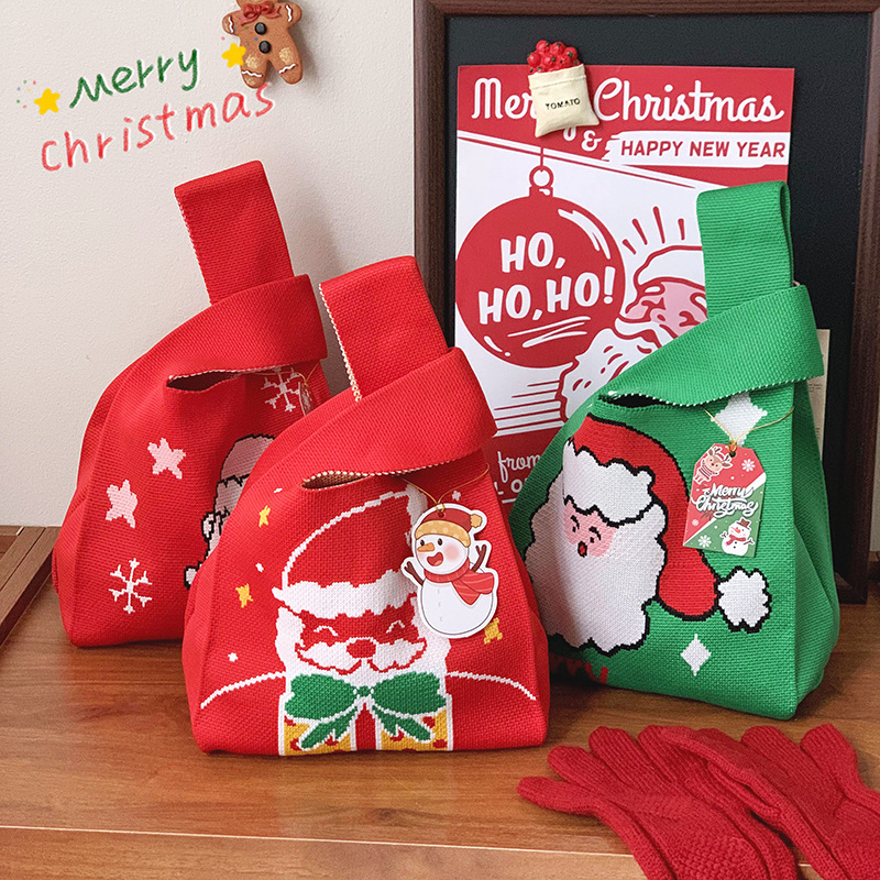 Bolsas de tejido de Navidad al por mayor bolsas de regalo de Nochebuena bolsas de dulces bolsas de regalo de empresa bolsas de mano creativas