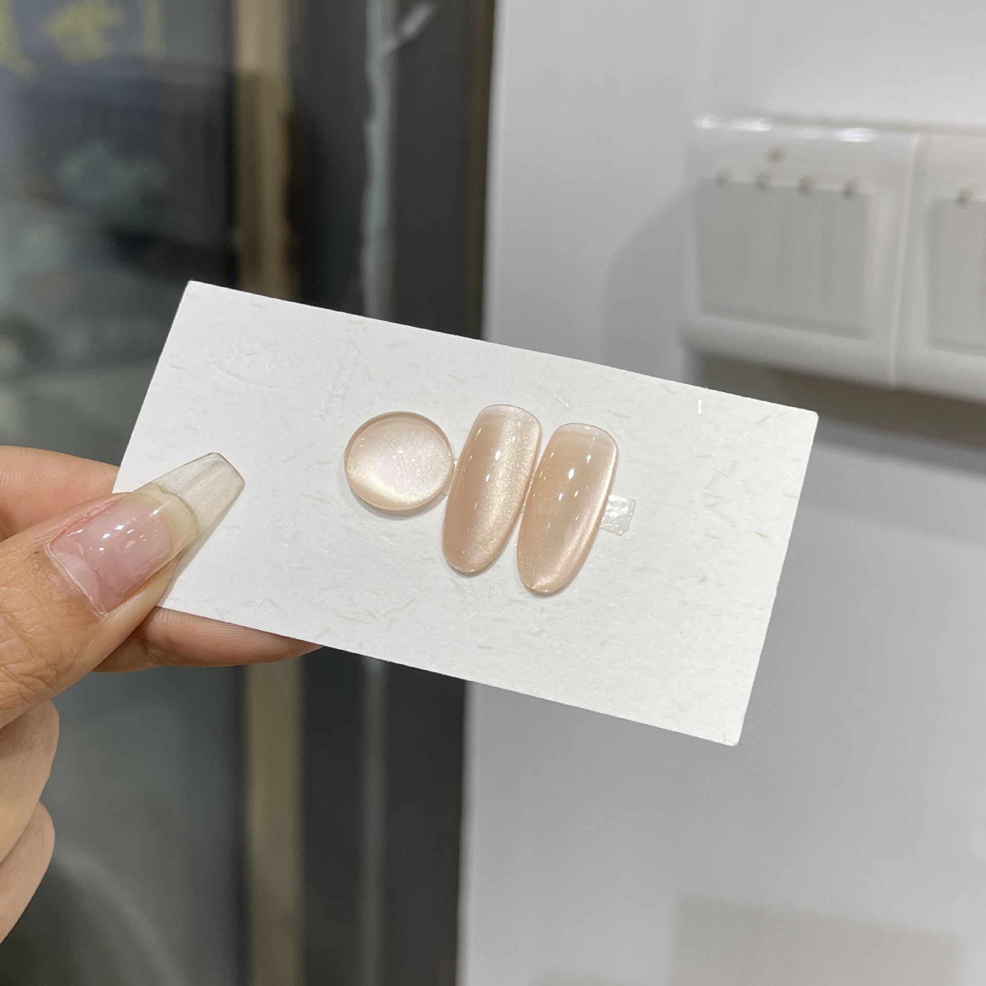 Venta caliente transfronteriza pegamento para ojos de gato rojo hielo arte de uñas celebridades de Internet caliente tienda de uñas de uso común pegamento de esmalte de uñas de ojo de gato de cristal popular