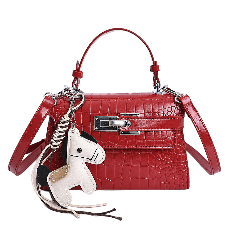 Bolsos de textura de nicho de cocodrilo de alta calidad, bolsos de mujer 2026 nuevos bolsos de mochila, bolsos de bloqueo de moda