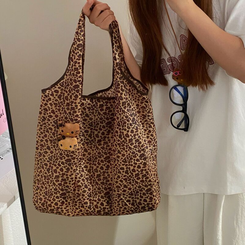 かわいいヒョウ柄の猫の折り畳み袋の大容量のハンドバッグの女性の大衆は携帯してミニ環境保護のショルダーバッグの女性を持ちます。|undefined