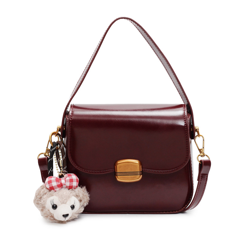 Bolso de tendencia popular de comercio exterior para mujeres 2025, nueva moda extranjera simple bolso de hombro de alta sensación bolso pequeño