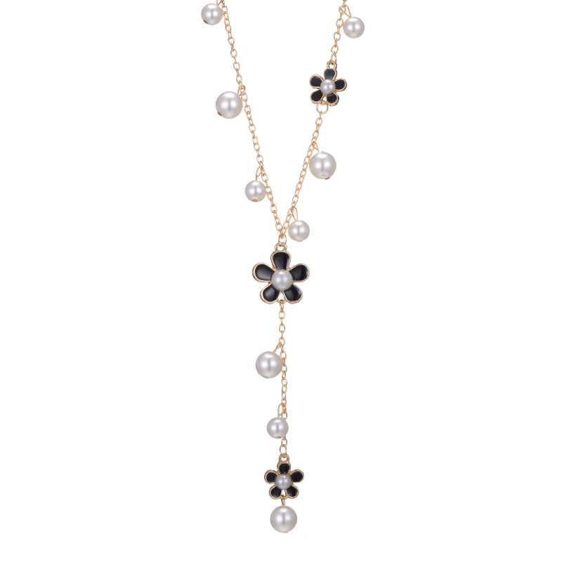 Estilo coreano moda de alta calidad borla larga cadena de suéter de flores de cinco hojas Otoño e Invierno simple collar de borla de todo fósforo joyería femenina