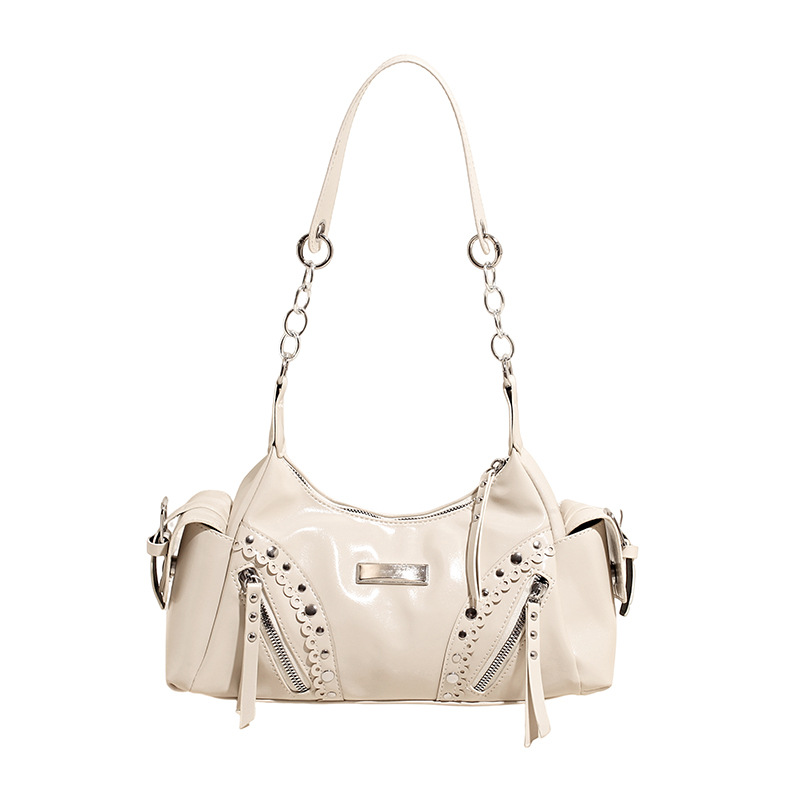 Bolso de axila de textura de alta calidad 2025 verano nuevo bolso femenino personalizado bolso de remache retro bolso de hombro de gran capacidad