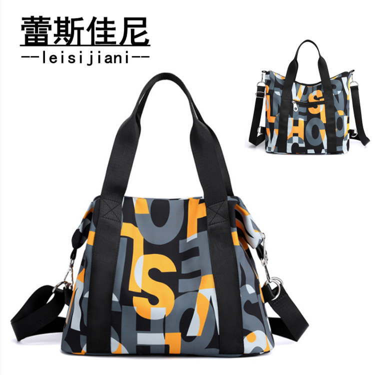 尼龙女包新款韩版字母单肩包女大容量牛津布手提斜挎包两用托特包