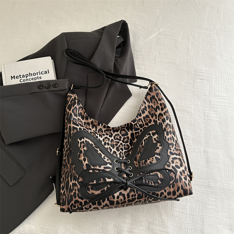 Bolso Tote con estampado de leopardo de moda Bolso de hombro de gran capacidad de moda de otoño e invierno de alta gama Bolso femenino de diseño 2025 Bolso retro