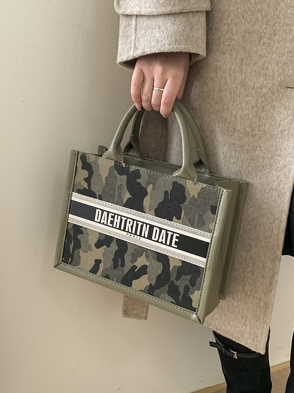 Bolso de mujer nicho coreano diseño de bolso de color camuflagado transfronterizo nueva textura de alta calidad lujosa bolsa de viaje