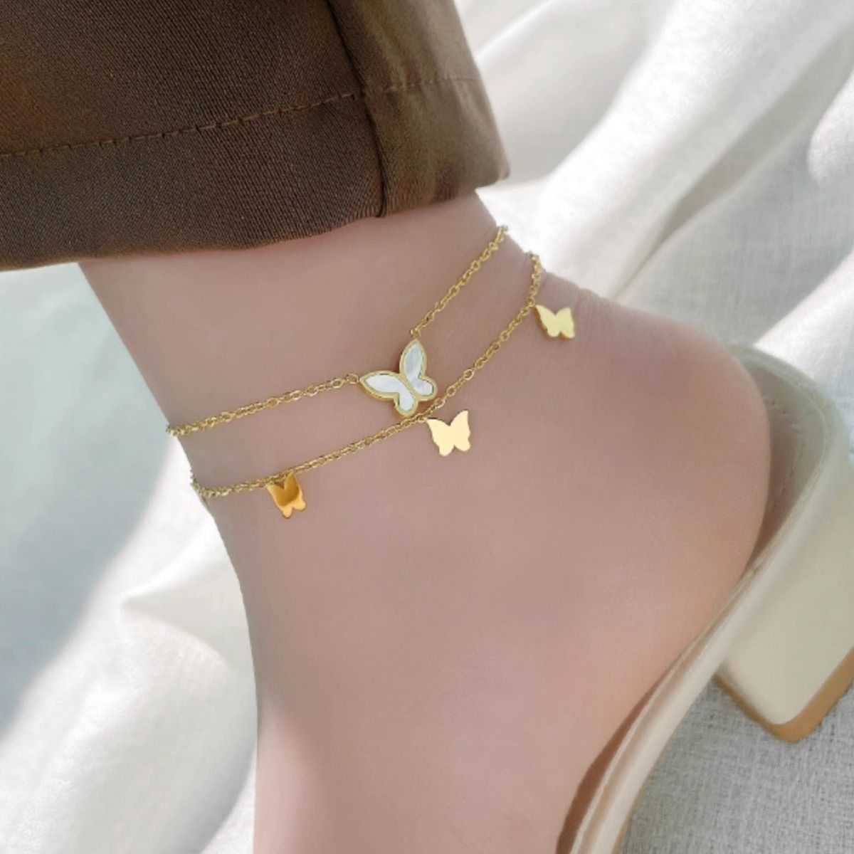 Butterfly Bracelet de alta calidad 18k oro nuevo estilo de cadena de tobillo de acero de titanio no decolor sexy nicho de tobillo para mujeres