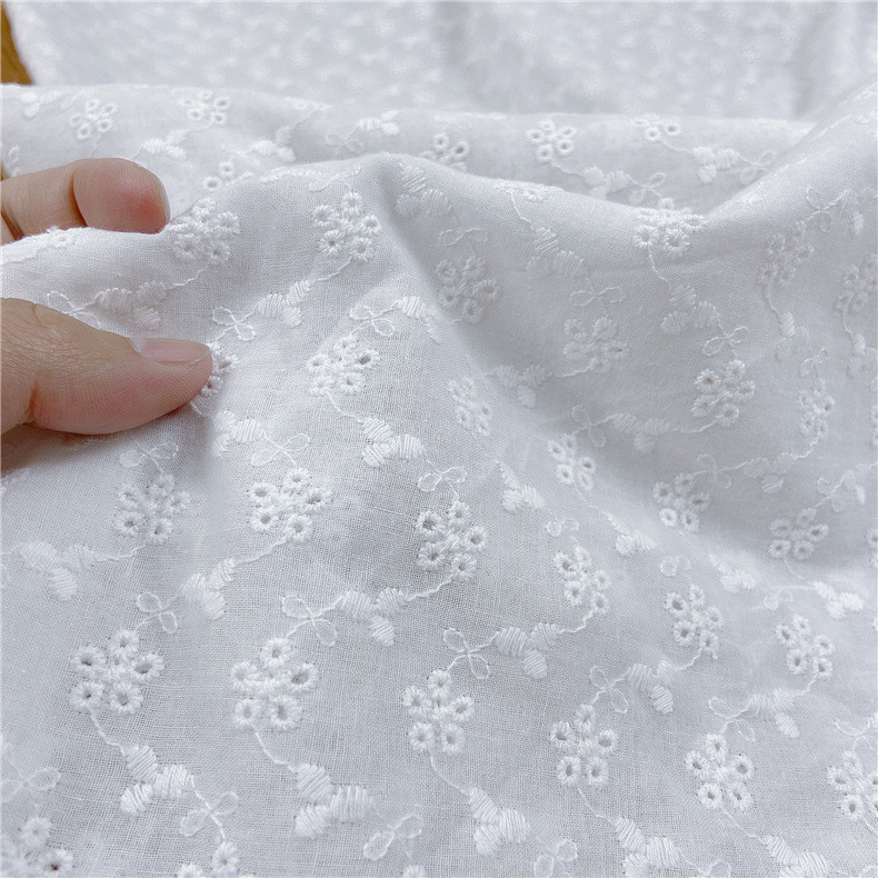 工厂直销新款纯棉布镂空打孔刺绣花边面料棉布绣花水溶绣花布批发