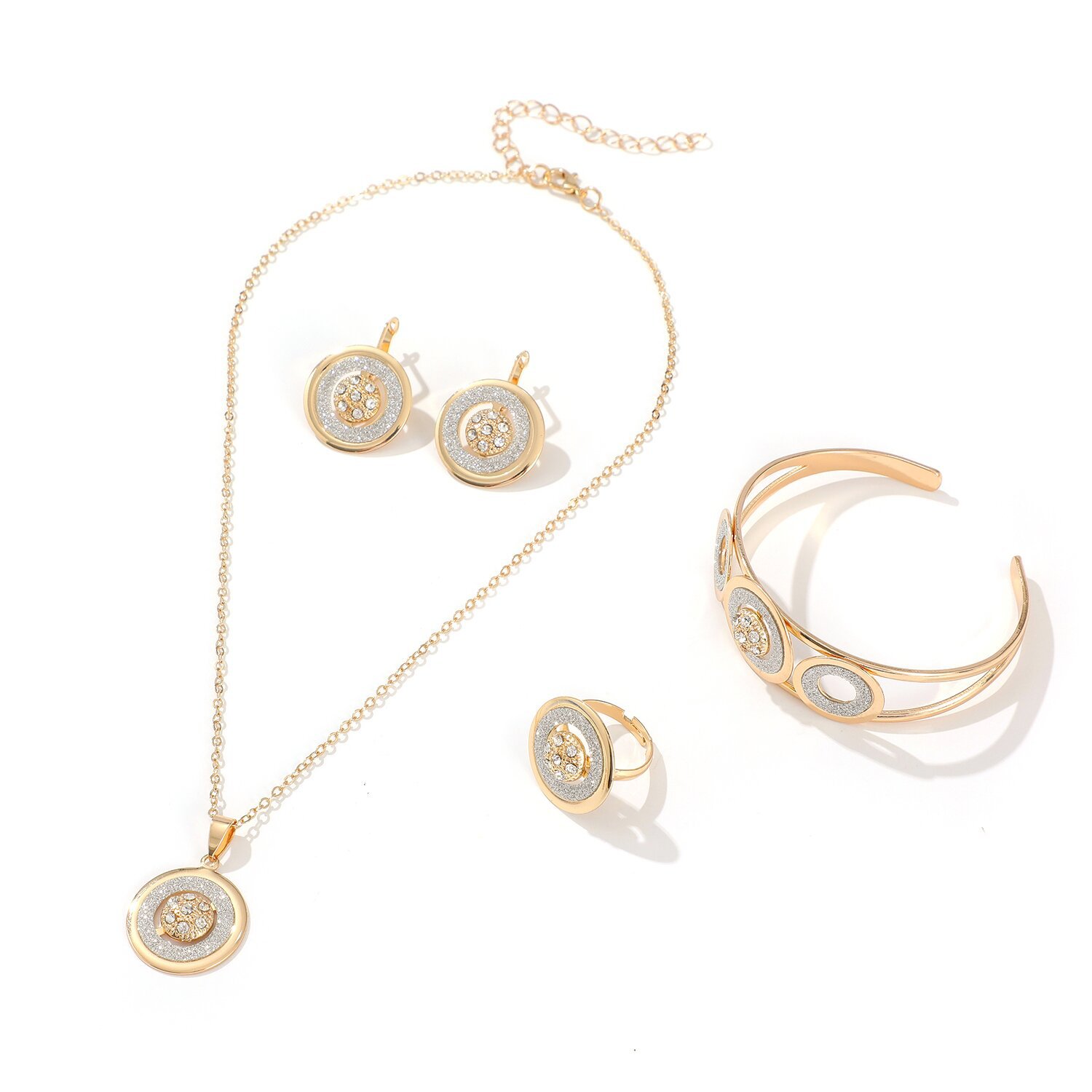 European and American style diamond-encrusted light luxury jewelry set, four-piece set including necklace, earrings, bracelet, and ring, with gold-colored round zircon stones