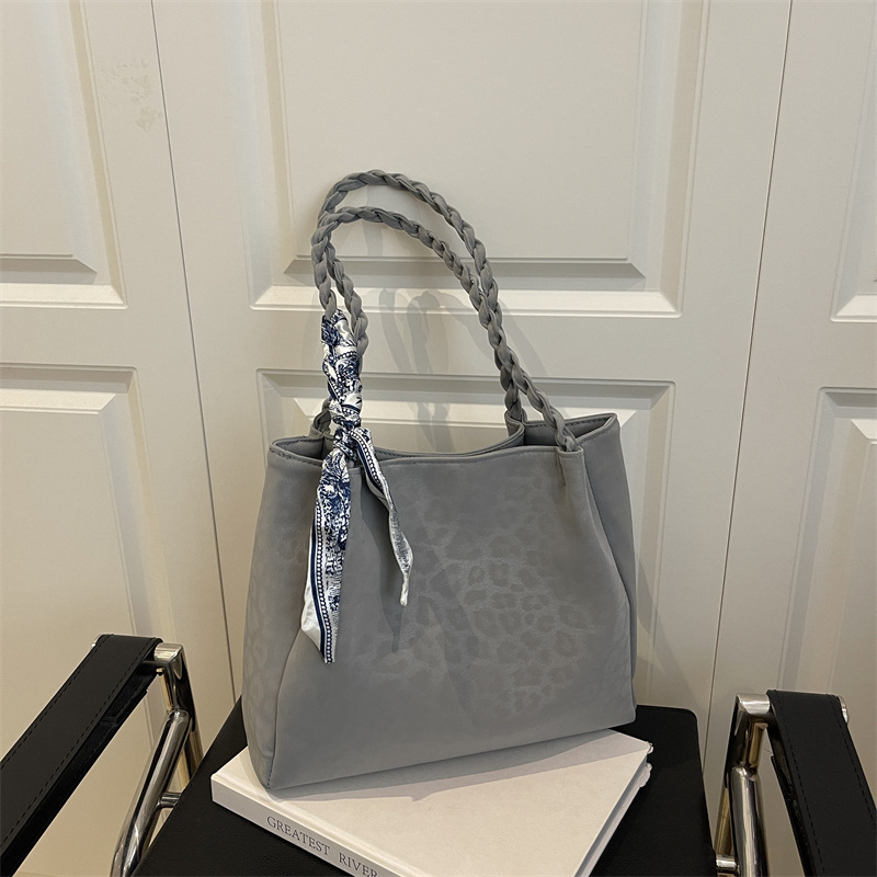 Retro leopardo de gran capacidad bolso tote mujer otoño e invierno 2025 ocio versátil viaje alto sentido de hombro mochila
