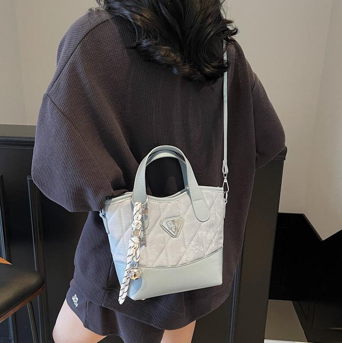 Bolso de cubo portátil de diamante de fuego súper caliente para mujer 2025 nueva tendencia bolso de hombro de todo fósforo bolso de mensajero de moda de nicho transfronterizo