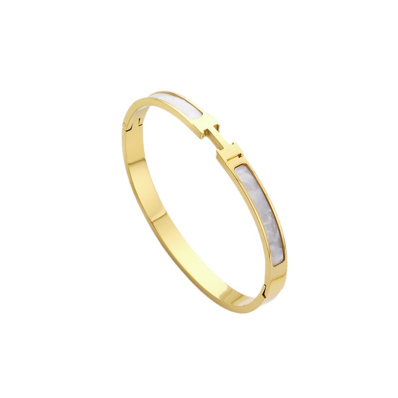Brazalete de acero de titanio para mujeres no desvanecerse pulsera de letras de alta versión transfronteriza venta caliente chapado en oro 18K joyas de acero inoxidable al por mayor