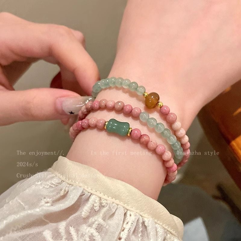 Nuevo estilo chino de pulsera de cuentas de múltiples anillos, estilo de mujer, pulsera de lujo ligera, pulsera de lujo sofisticada, pulsera rosa de nicho de alta calidad.