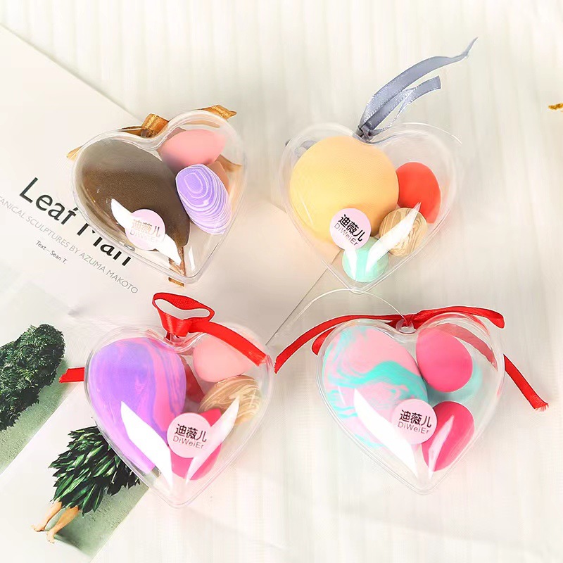 El amor de los huevos de maquillaje no comer polvo, polvo seco y húmedo, maquillaje con un pequeño conjunto de polvo de maquillaje de huevos de color al por mayor.