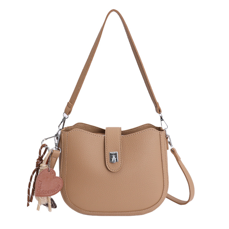 Hot sale nuevo nicho coreano litchi estampado bolso de cubo de hombro para mujeres sensación de lujo ligero versátil bolso de transporte de viaje