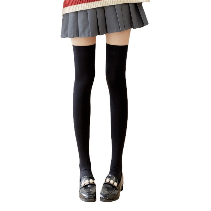 Calcetines de terciopelo de color sólido sobre la rodilla JK medias en blanco y negro al por mayor delgada sexy adelgazante versátil largo muslo Calcetines