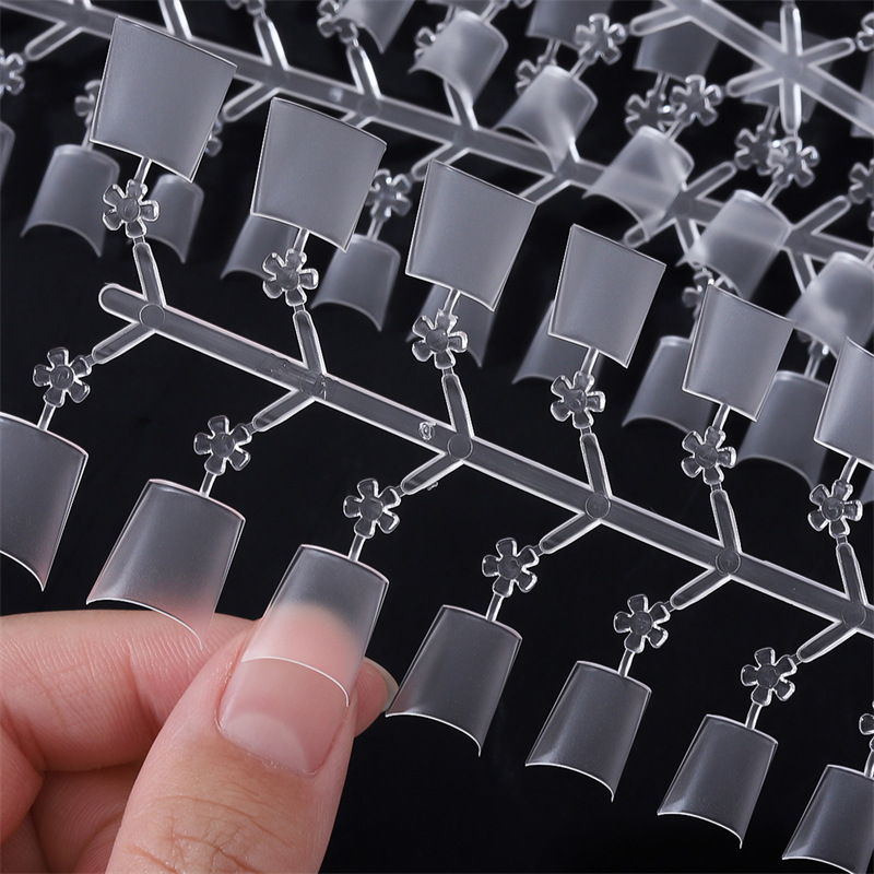 Exclusivo transfronterizo 240 piezas en caja de luz de uñas pegatinas de uñas C Arco ultrafino sin costura sin tallado escalera corta Oval uñas falsas