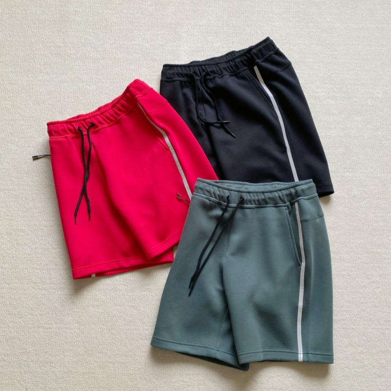 Pantalones cortos deportivos pantalones casuales sueltos de algodón fino de verano para hombres