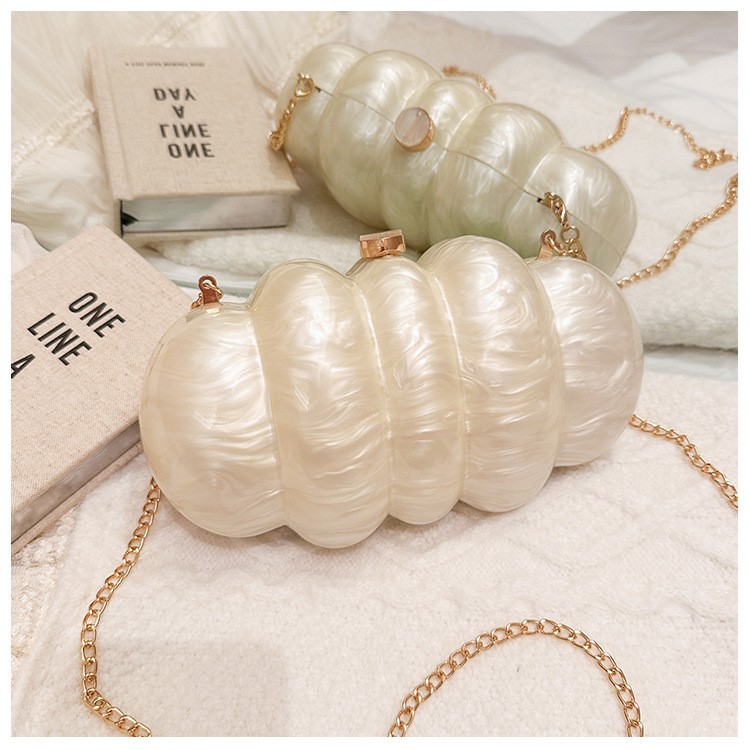 Comercio exterior transfronterizo damas nueva bolsa de cena nube acrílico bolsa de mano de boda ligera cadena de lujo oblicuo paquete de noche