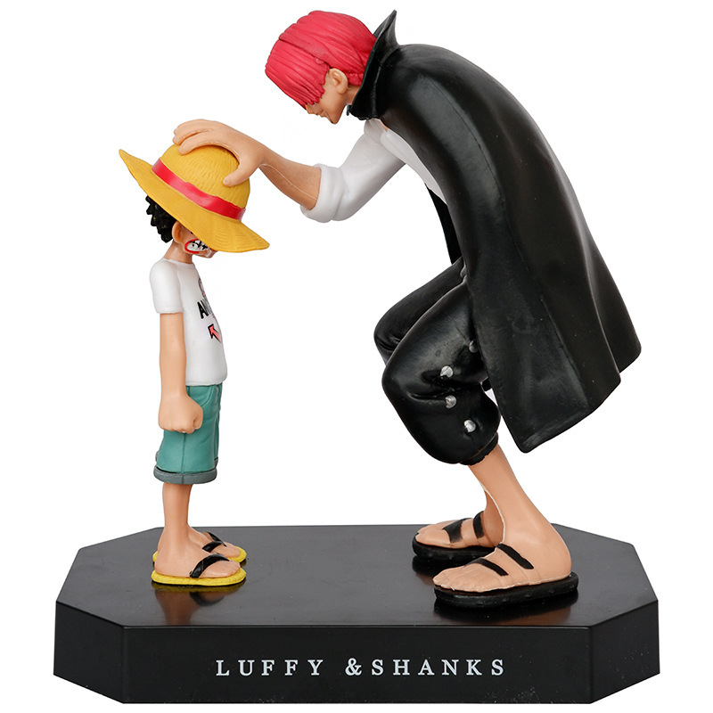 Una pieza periférica sombrero de paja Luffy pelo rojo toque cabeza xiangx bolsa de escena hecha a mano modelo de coche Decoración