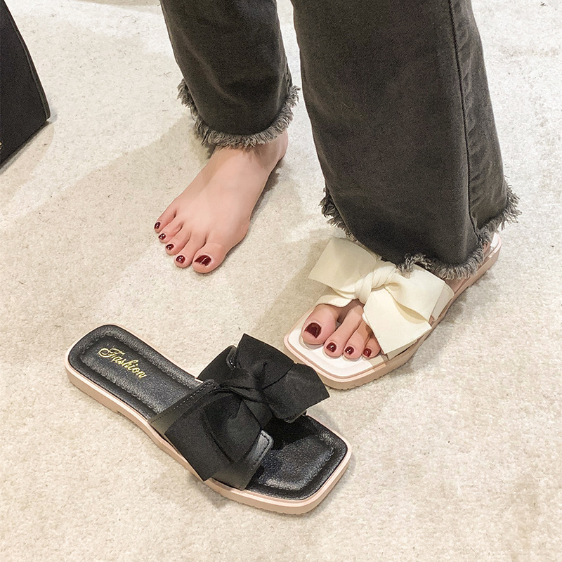 香風蝶結びの一字スリッパの女性夏の外はネットの赤い新型のファッションの平底のアンドロメダの風を着て涼しくて柔らかい底を引きずっています。|undefined