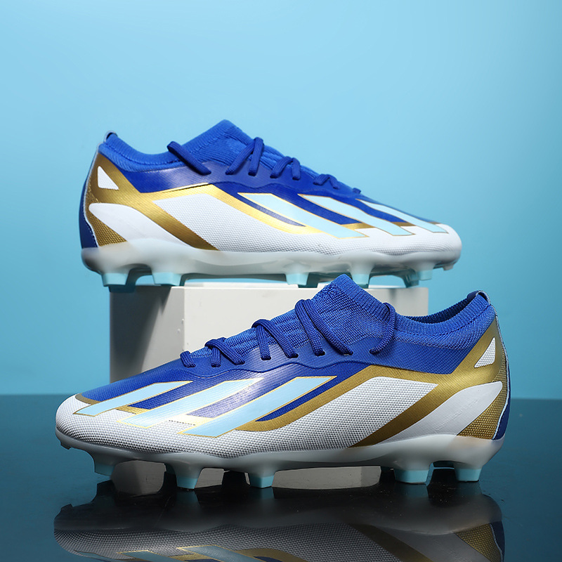 Nuevos zapatos de fútbol transfronterizos Putian zapatos de entrenamiento de entrenamiento de la Copa del Mundo de clavos largos de baja altura al por mayor