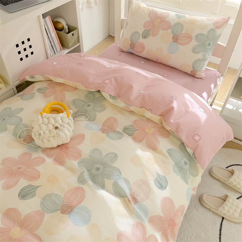 Dormitorio traje de cama de algodón de tres piezas 2025 nuevo estudiante universitario individual juego completo de sábanas de edredón de algodón para todas las estaciones