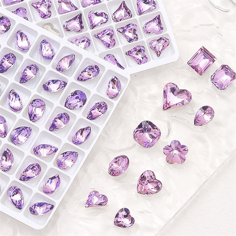 K9 Joyería de diamantes de uñas luz púrpura especial en forma de diamante de fondo puntiagudo Super Flash cuadrado de grasa corazón torcido oval clavo Diamante de cristal al por mayor