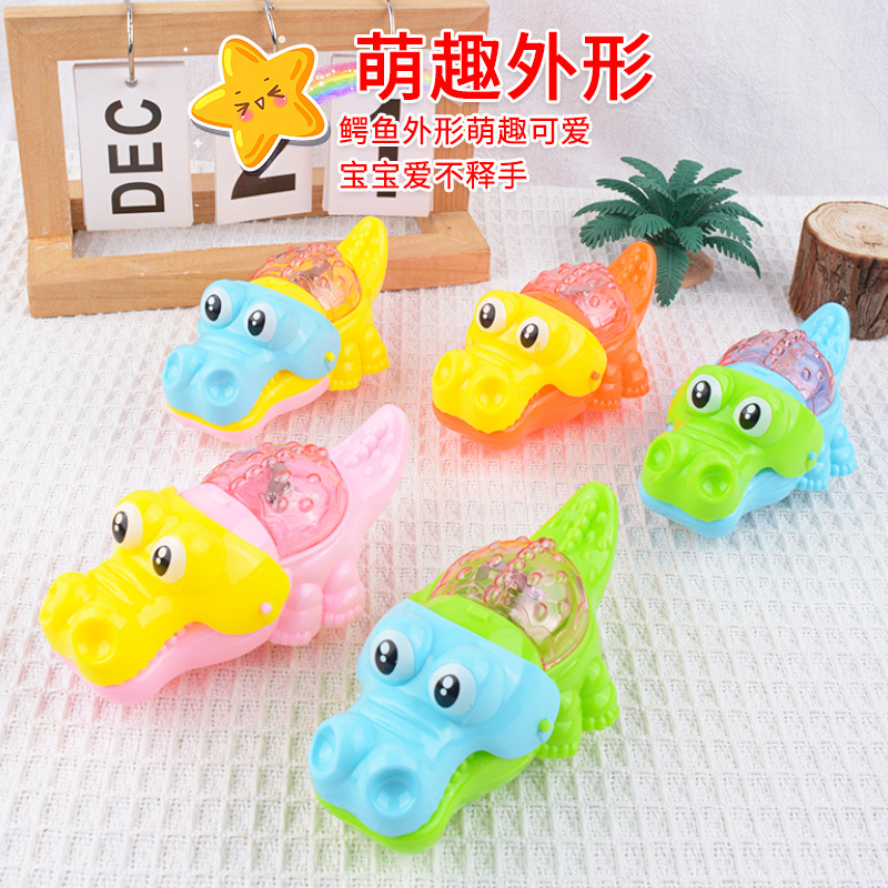 Hilo de tracción creativo, cabello luminoso, dibujos animados de cocodrilo, lindo y divertido, tirón de cuerda, puesto de cocodrilo flash, juguetes para niños de azúcar al por mayor