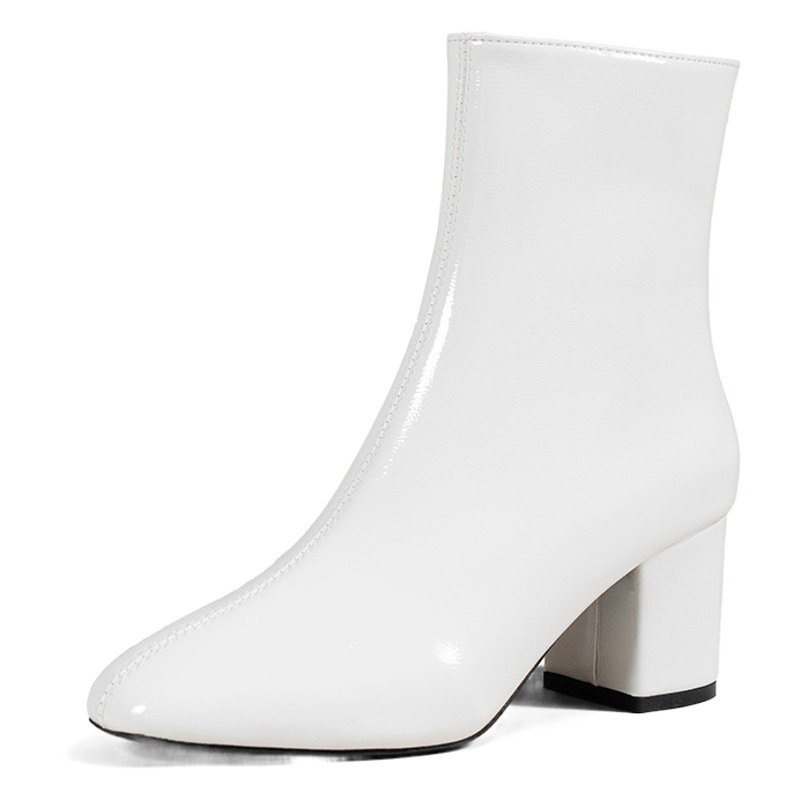 Tacones altos botas cortas para mujeres 2026 otoño nueva cremallera laterales botas de tamaño grande tacones gruesos zapatos de mujer de comercio exterior transfronterizo