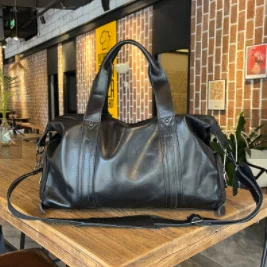 Leather sports travel bag, capacious luggage sports bag for training, cowhide