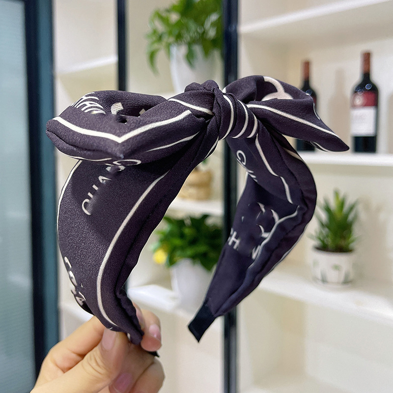 髪のカチューシャの女性のファッションの新型の顔を洗って滑り止めの森の女性の百合は広いネットの赤い広い辺の蝶結びの小さい香の風のカチューシャをプラスします。