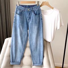 夏の薄いサイズのお父さんのジーパンの女性のナシの形の体つきは肉を遮ってやせている太っている妹の新型の9分のハーレムのズボンを現します。