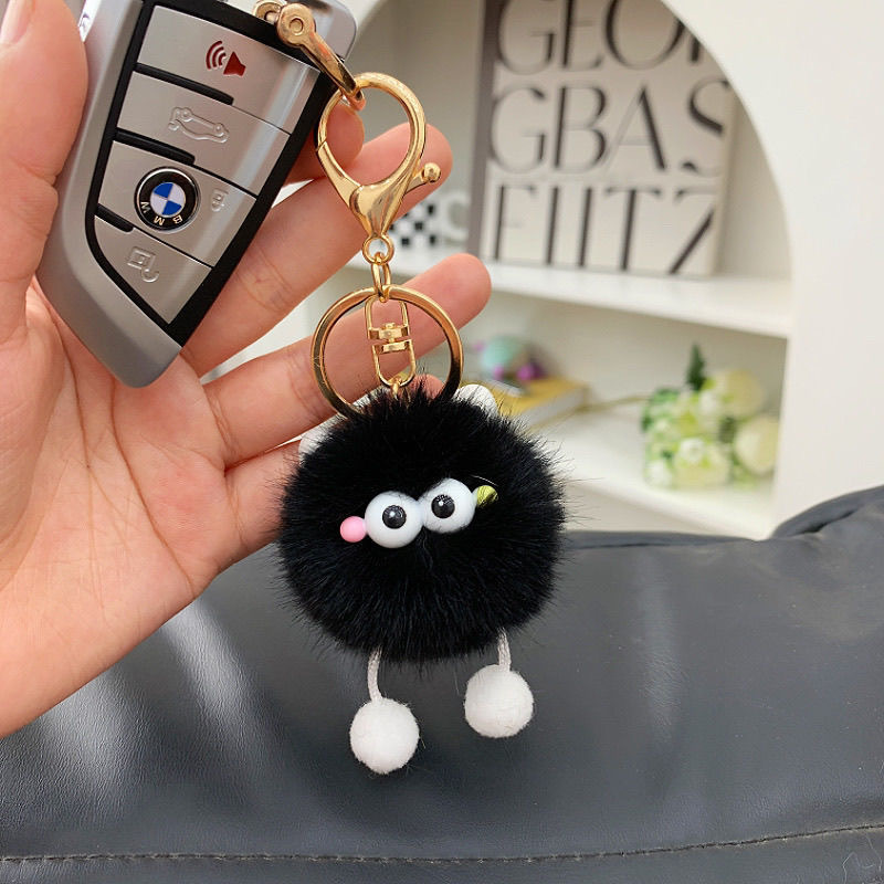Suministro de nuevos lindos dibujos animados elfos de carbón pequeño colgante de pelusa colgante llavero de automóvil bolso colgante