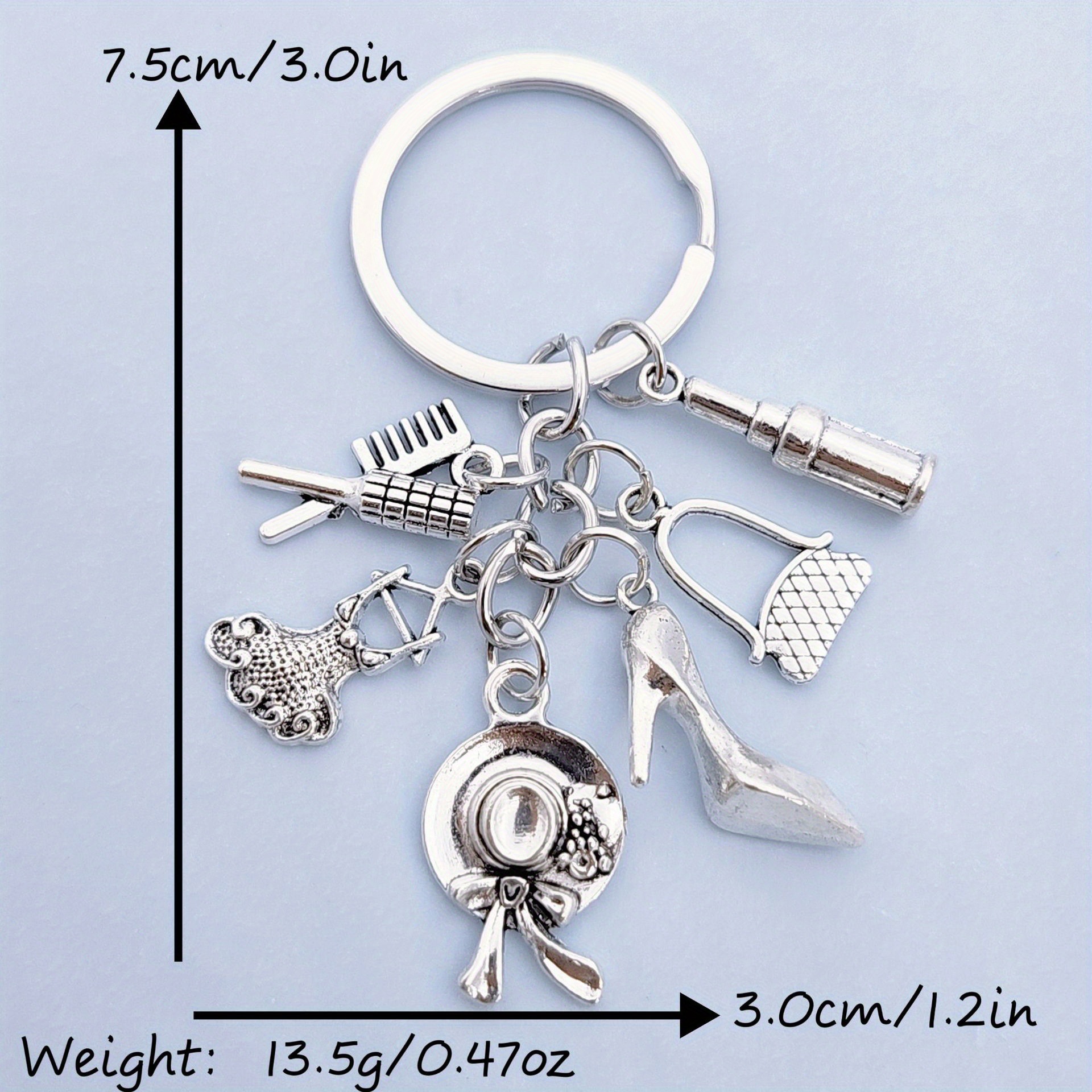 Serie de oro de aleación de venta transfronteriza caliente fútbol béisbol rugby sombrero hechicero puño llavero colgante mochila