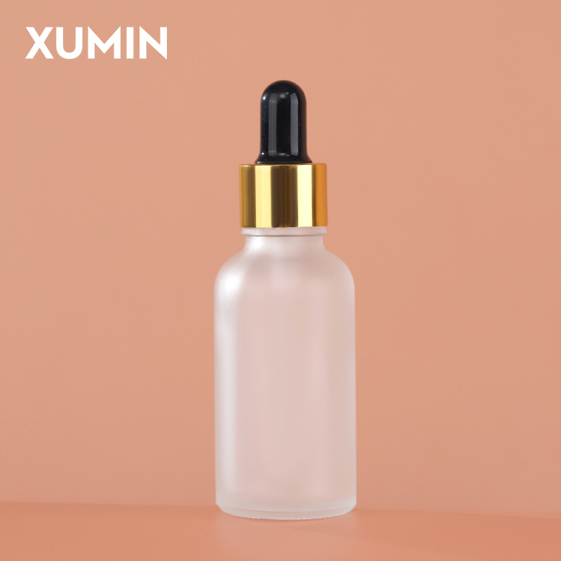 Embalaje cosmético botella de vidrio esmerizada botella de gotas líquidas de hombro redondo anillo de aluminio eléctrico botella de aceite esencial 30ml
