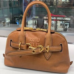 MIU Miaojia Melade シェルバッグ女性の 2025 新しいレトロボウリングバッグ本革ハンドバッグショルダーレディースバッグ