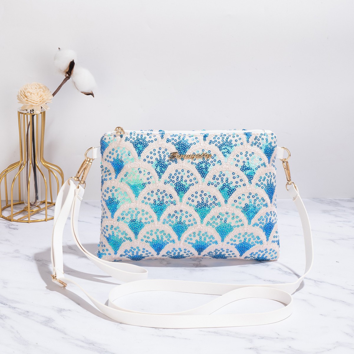 Nicho de estilo nacional de verano 2025 nueva cadena de moda alta sensación de moda sequinilla portátil bolsas de tramo oblicuas