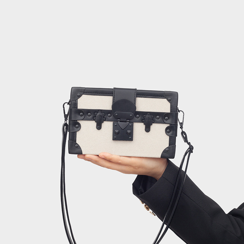 今年流行潮牌单肩包2025新款喷漆锁扣手提包气质拼色休闲盒子女包