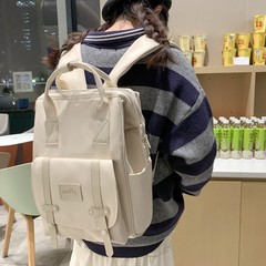 新型リュックサックのシンプルな女子大学生のカバンは軽くて、日本の学生のカバンの大容量の旅行リュックサックになります。