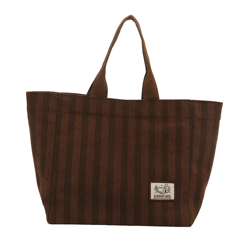 Bolso tote de tela a rayas de estilo europeo y americano, nuevo bolso pequeño de moda, bolso femenino portátil, bolso de almuerzo de mano, bolso de bocadillos