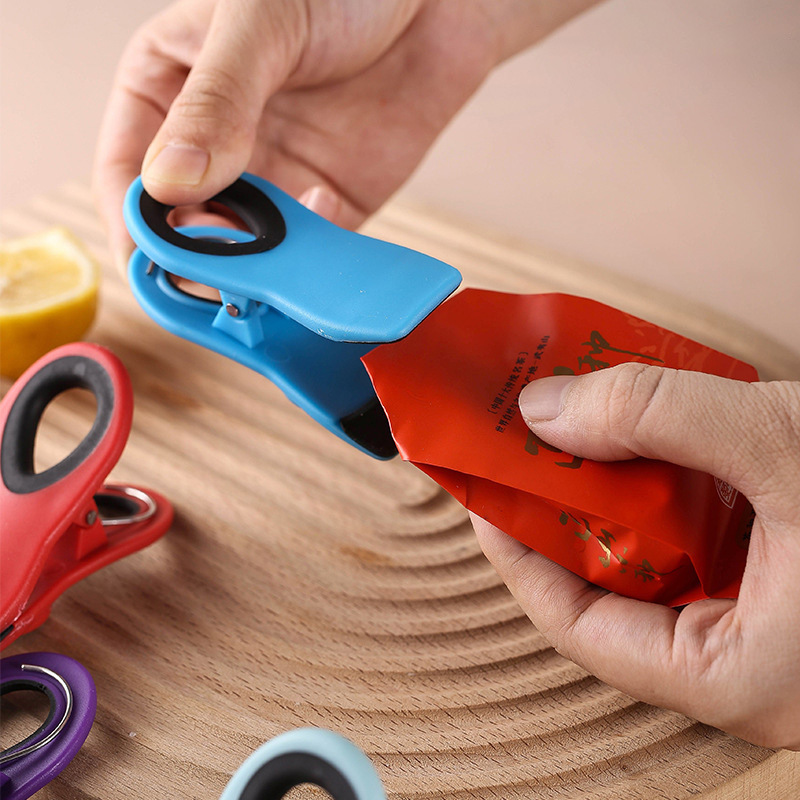 El mismo clip de refrigerador creativo multifuncional para bocadillos a prueba de humedad, clip de alimentos frescos, un cabello