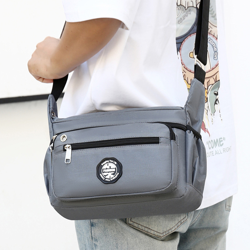 Nueva bolsa de hombre multicapa bolsa de tela bolsa de negocios ocio bolsa de entrega al aire libre mochila de hombro bolsa de negocios