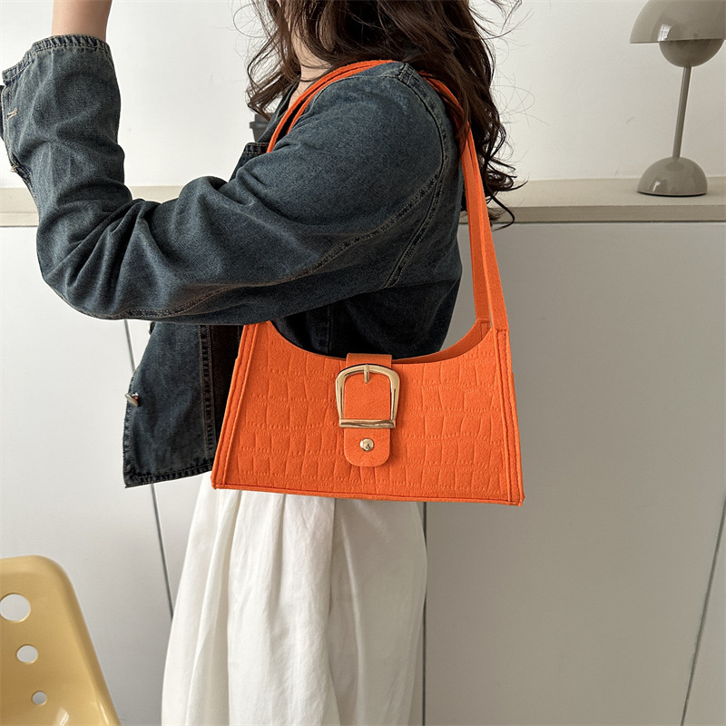 Demi-season shoulder bag with diamond pattern