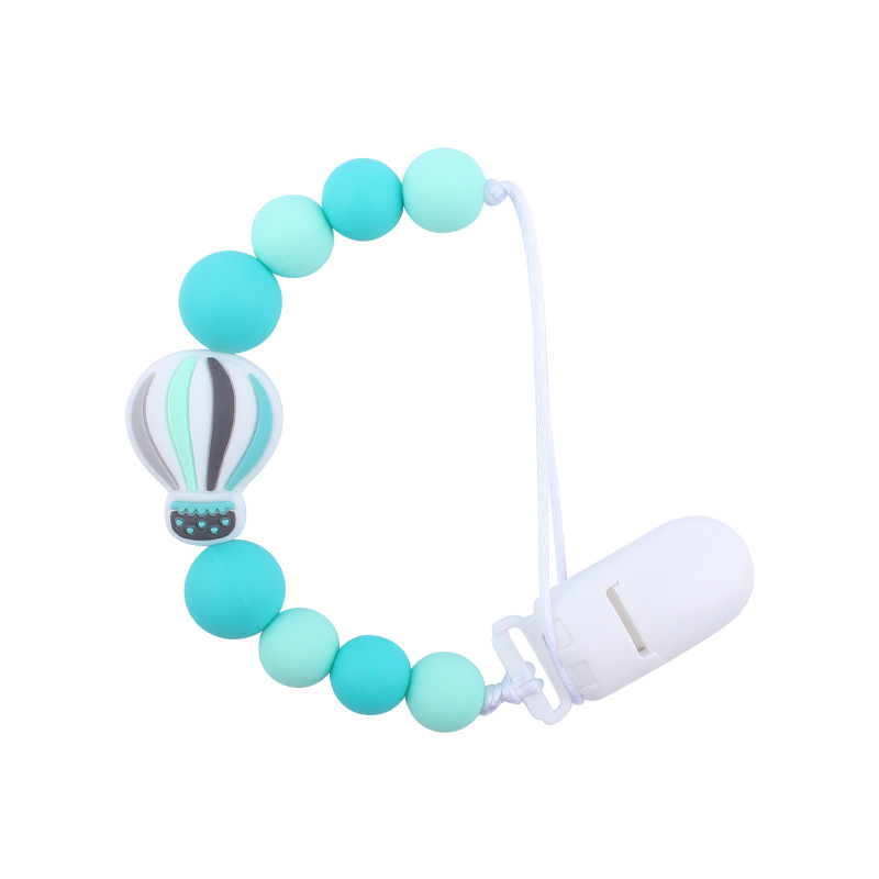 Nuevo bebé suministros chupete cadena creativa dibujos animados globo de aire caliente de silicona mordedura cadena anti-gota molar
