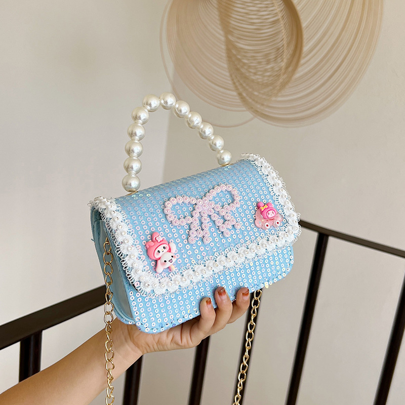 2025 nuevo lindo arco princesa bolsa de perlas portátil moda versátil mochila de hombro bolso de cambio coreano